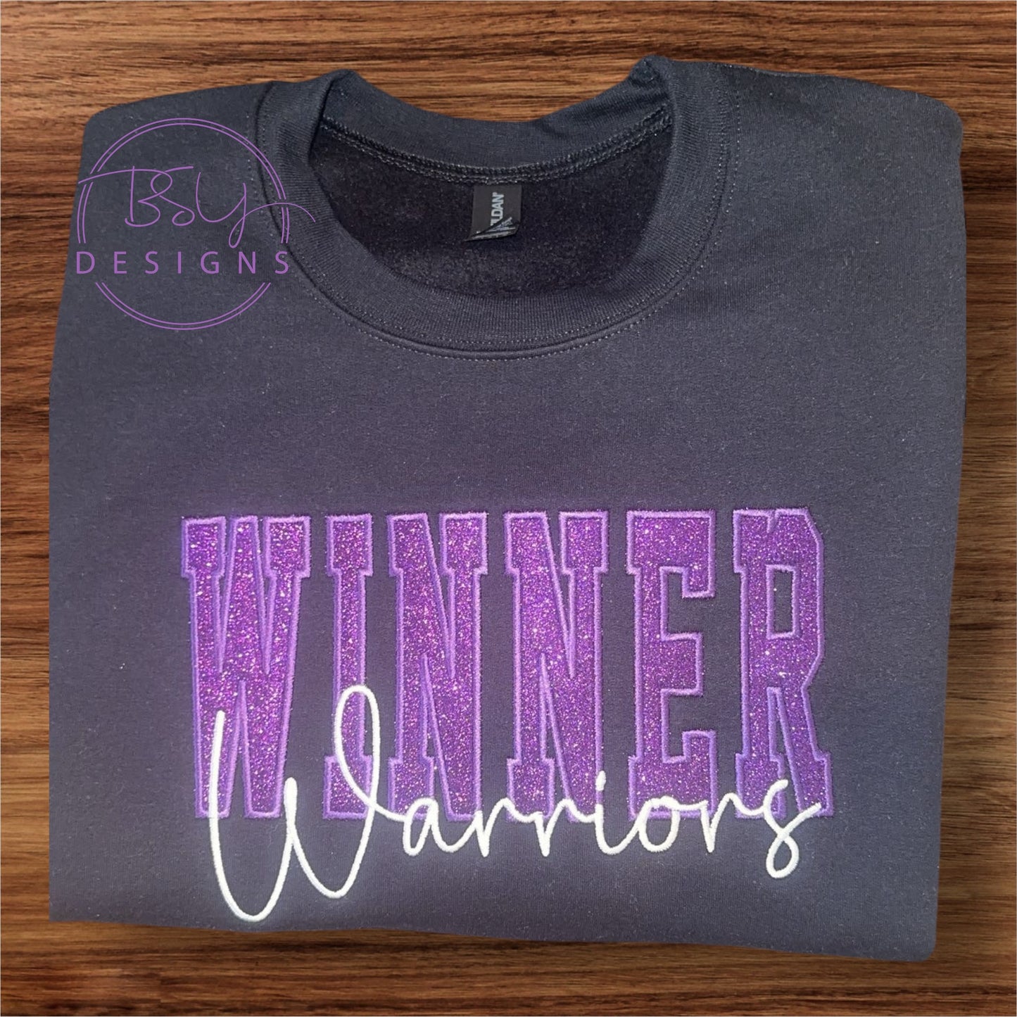 Winner Warriors embroidered design available in short sleeve, crewneck, and hooded sweatshirt styles