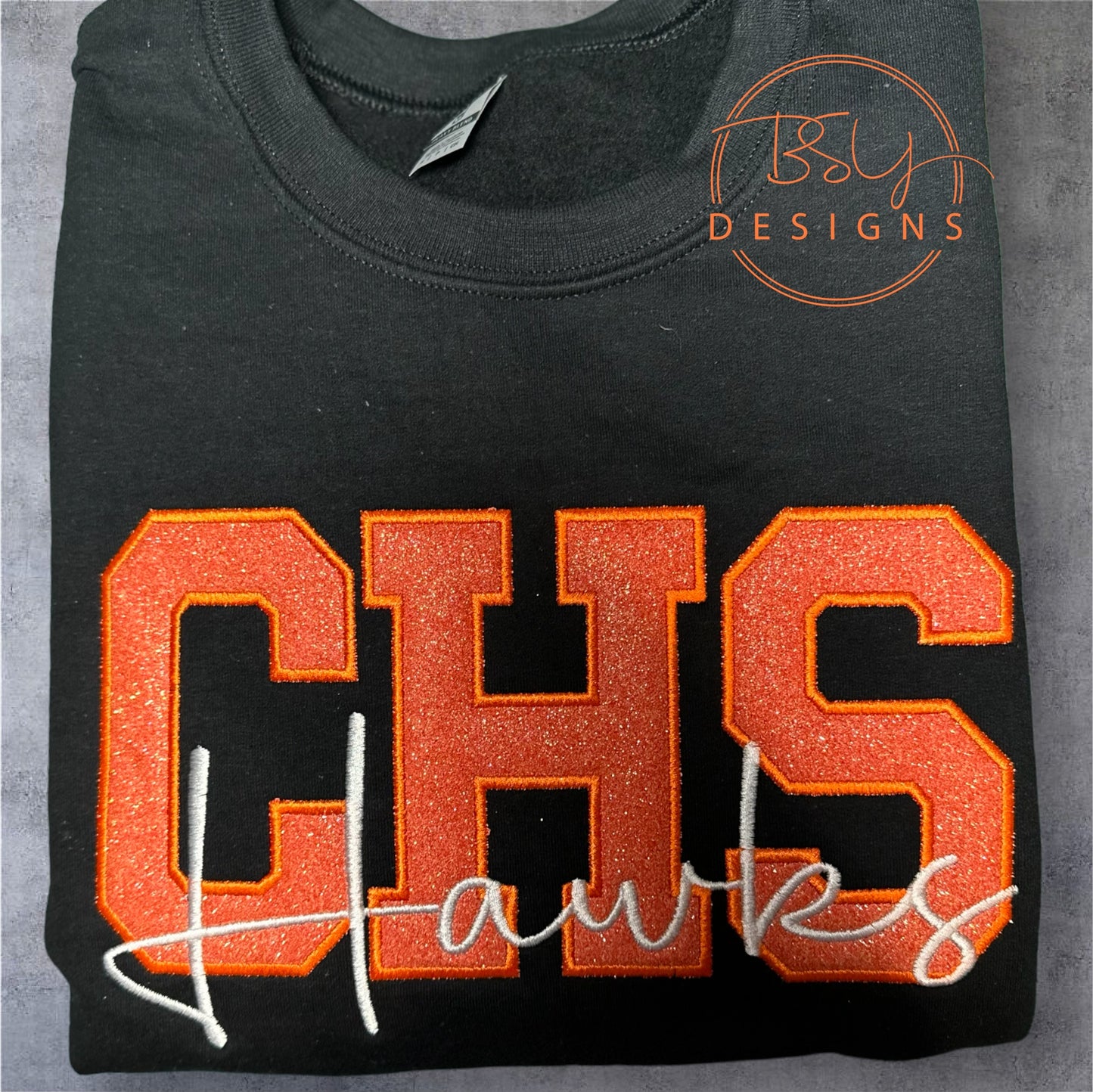 CHS Hawks embroidered design available in short sleeve, crewneck, and hooded sweatshirt style